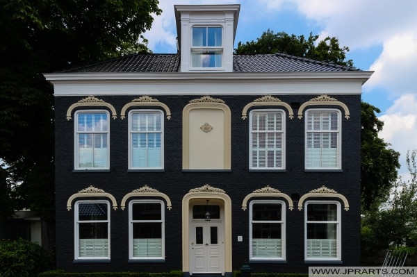 Dark blue house in Assen