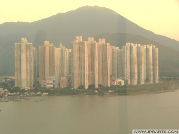 Yat Tung Estate viewed across Tung Chung Bay, with Sunset Peak in the background