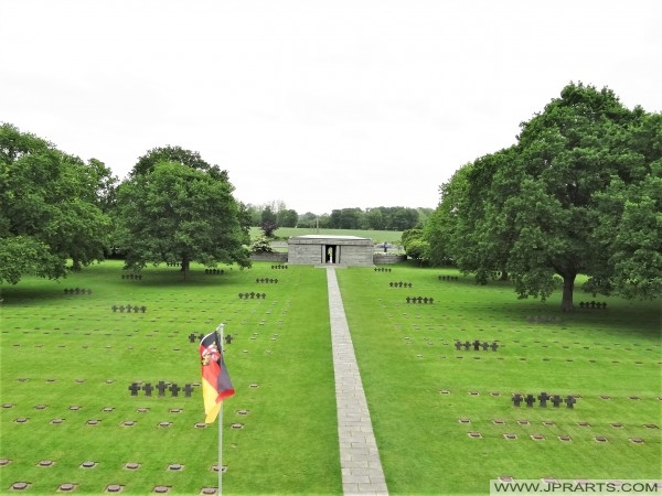 Section of the cemetery viewed from the Tumulus. The graves of SS officer Michael Wittmann and his Tiger 007 crew lie just beyond the trees on the left (Normandy, France)