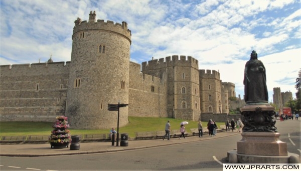 Windsor Castle and Statue of Queen Victoria in Berkshire, England Windsor Castle and Statue of Queen Victoria in Berkshire, UK