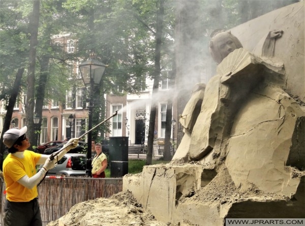 Spraying Water on the Japanese Sand Sculpture during the World Championship 2018 in The Hague, The Netherlands Spraying Water on the Japanese Sand Sculpture during the World Championship 2018 in The Hague, The Netherlands